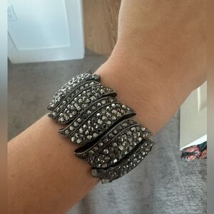 Black and silver cuff bracelet. Unknown brand. Great condition.
